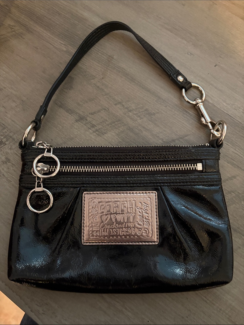 Coach Black Patent Leather Wristlet with Tan Logo Patch